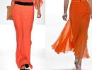 Oranžová sukňa až po zem - s čím nosiť?
